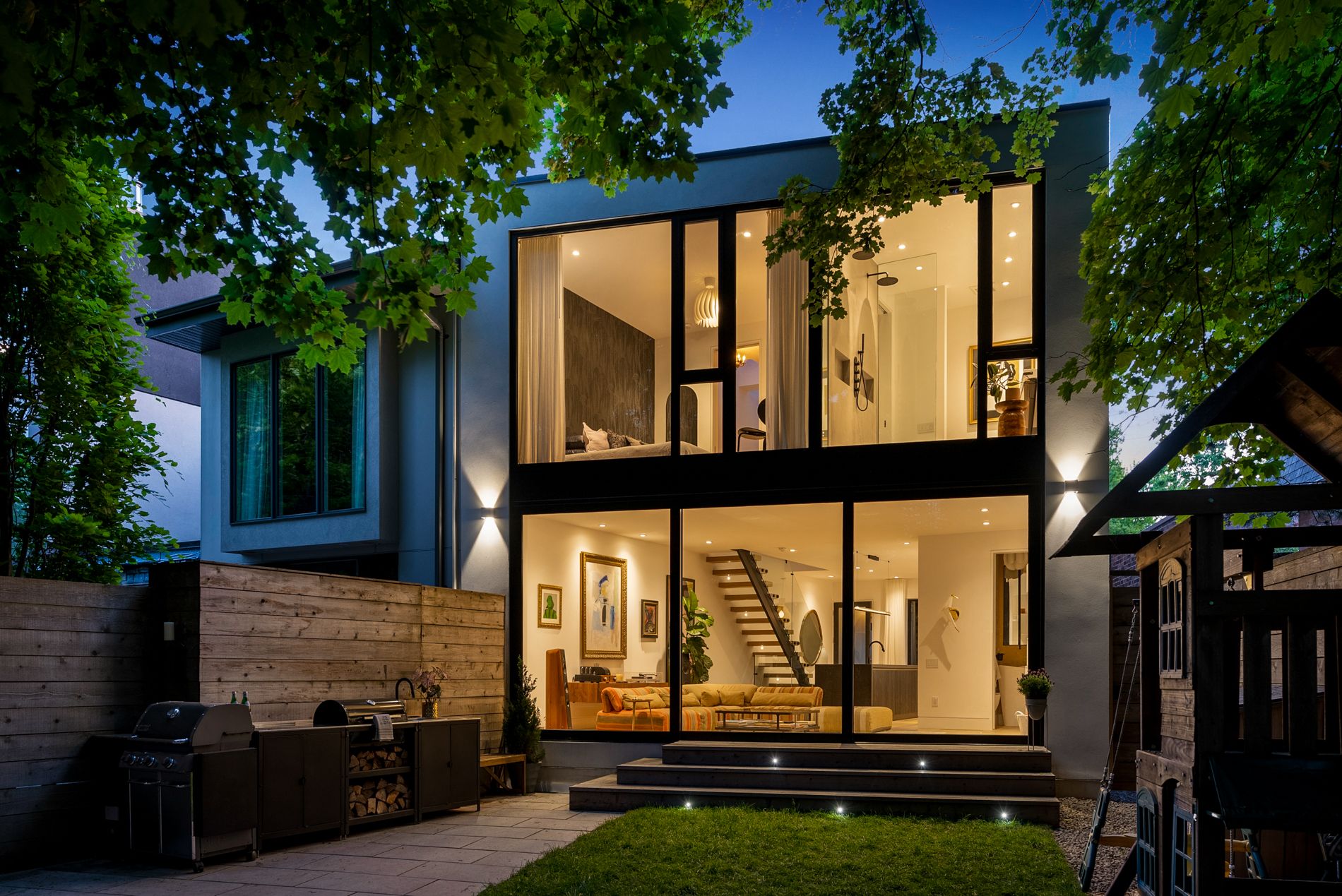 Summerhill Gardens modern home at dusk