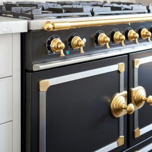 Transitional Kitchen with Black and Gold La Cornue Range Appliance