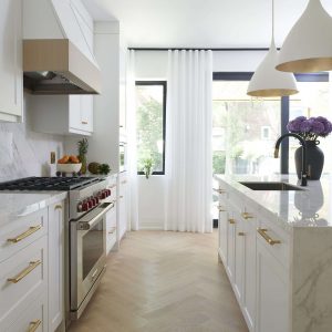 Transitional kitchen design with marble and brass finishes Toronto Rosedale Home